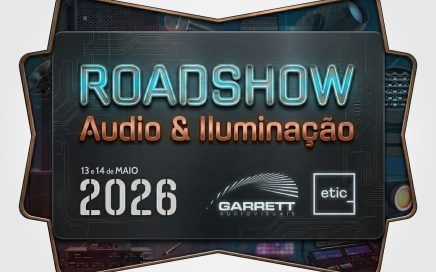Event poster for Roadshow Audio & Iluminação with neon blue 'ROADSHOW' and copper 'Audio & Iluminação' text, date 2026 and logos.